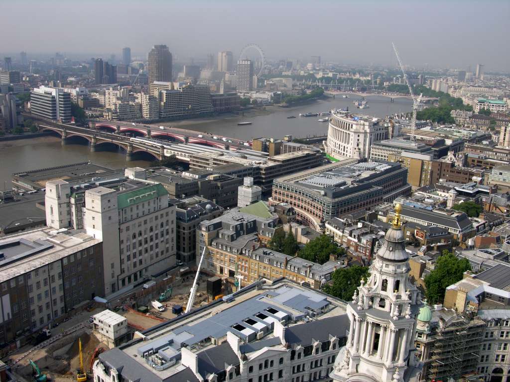 London St. Pauls Cathedral 09 Golden Gallery View Of Thames We climbed 86m to the Golden Gallery at St. Paul�s Cathedral and enjoyed a spectacular view of London. Here is the view to the south west with the Thames River snaking through London, and the London Eye ferris wheel visible on the horizon.